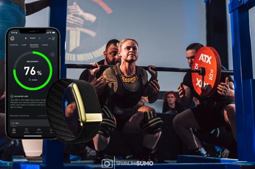 Whoop strap with app overlaid on a photo of a female squatting in a powerlifting competition
